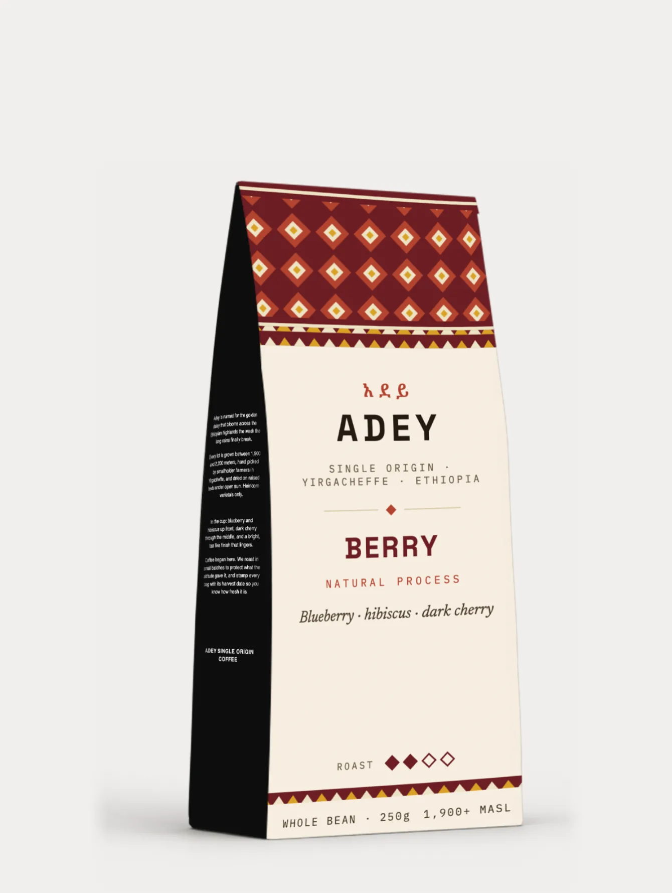 The Berry bag with an oxblood woven band, natural process, and the notes blueberry, hibiscus, dark cherry