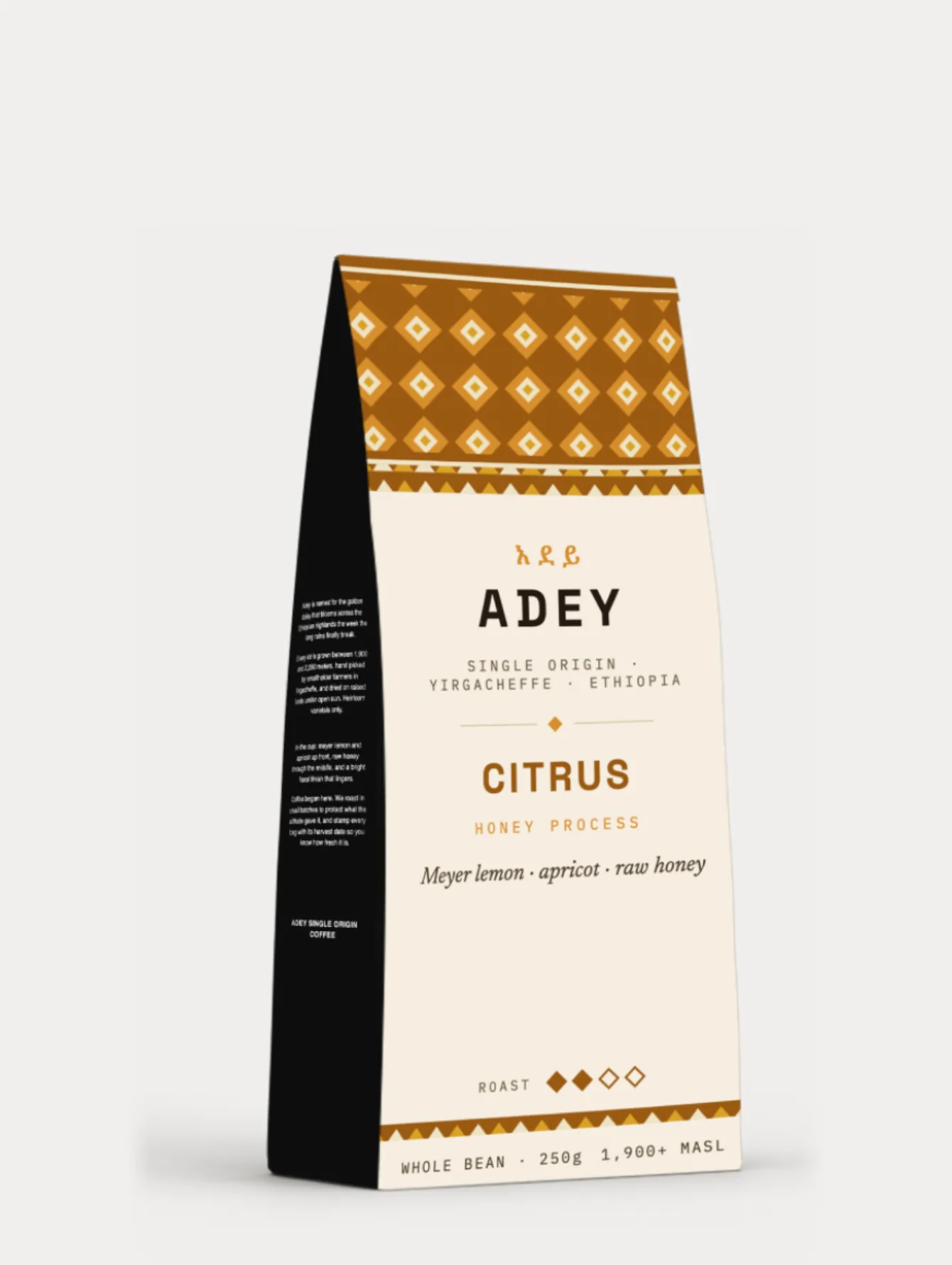 The Citrus bag with an amber woven band, honey process, and the notes meyer lemon, apricot, raw honey
