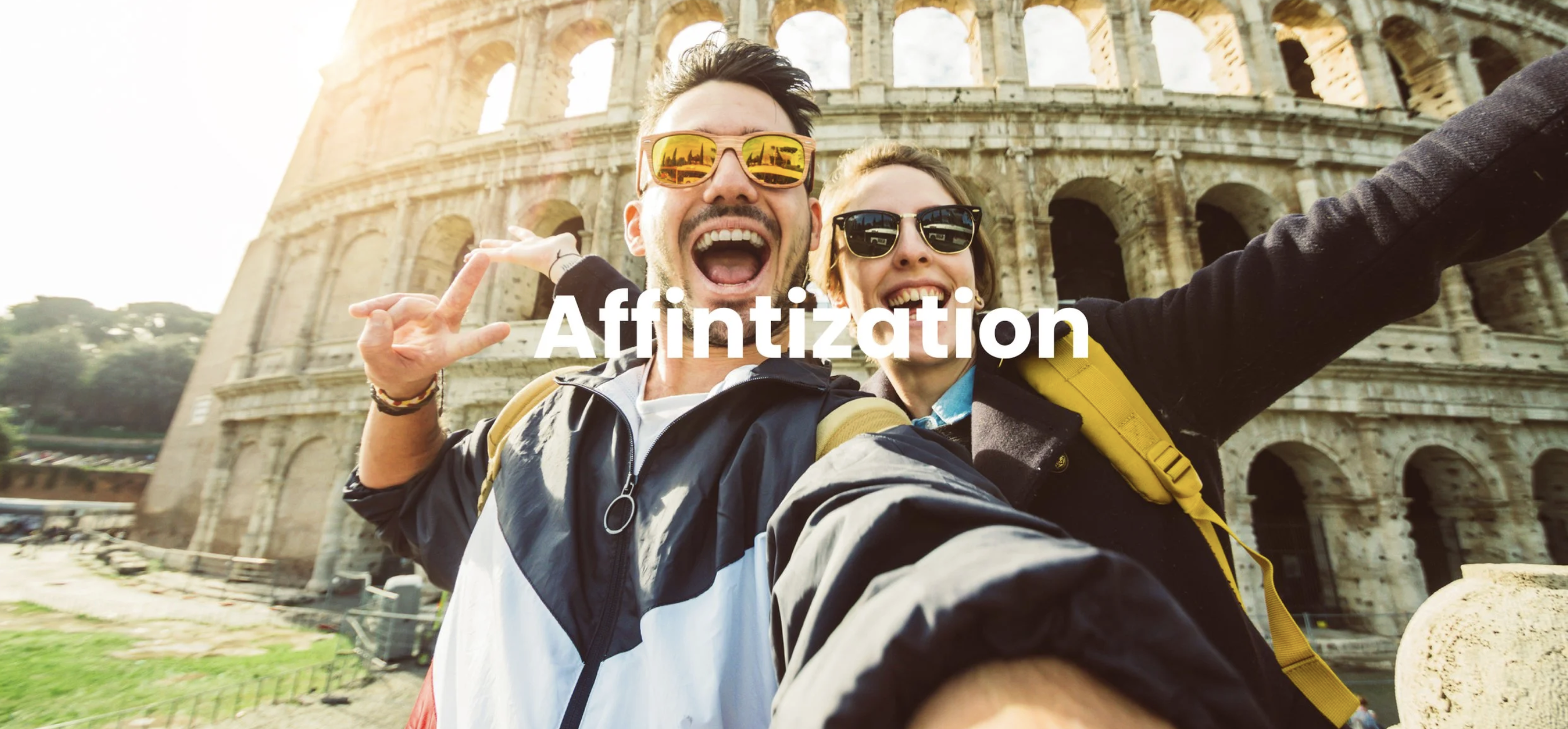 Affintization section title over a joyful couple at the Colosseum in Rome